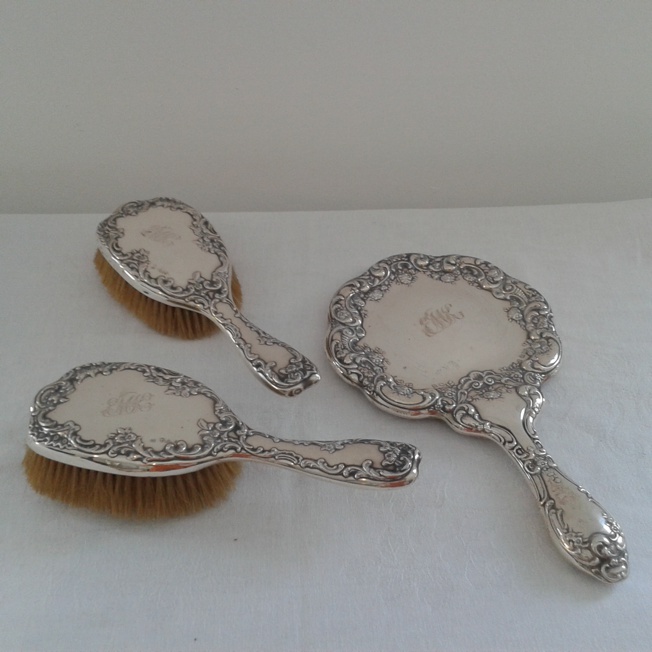 Silver brush set engraved with EMK